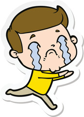 Obraz premium sticker of a cartoon man crying
