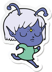 sticker of a cartoon alien girl
