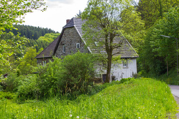 Fototapeta na wymiar Bergisches Land in Germany - landscape with house