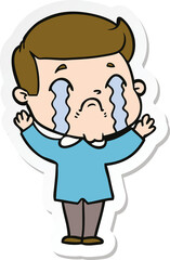 sticker of a cartoon man crying