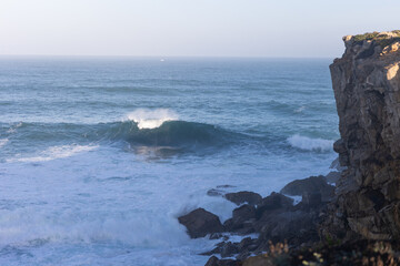 Fototapeta na wymiar Turquoise sea waves in day light