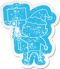 happy cartoon distressed sticker of a bald man wearing santa hat