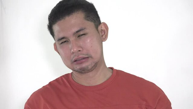 stressed young filipino man