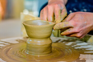 Artisan making pottery at Thanh Ha pottery village, Hoi An (Vietnam)