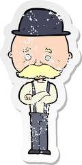 retro distressed sticker of a cartoon man wearing bowler hat