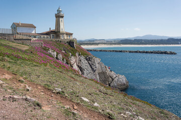 Fototapeta na wymiar Asturias, lighthouse of San Juan, Aviles, Cantabrian sea, springtime 