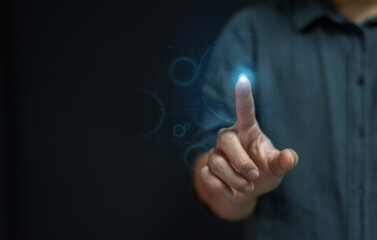  business man hand pointing at abstract glowing polygonal sphere and digital business interface on...