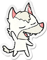 distressed sticker of a cartoon wolf laughing