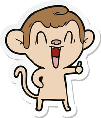 sticker of a cartoon laughing monkey