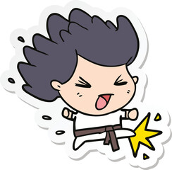sticker of a cartoon kicking karate champ