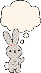 cute cartoon rabbit and thought bubble in comic book style