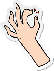 sticker of a cartoon hand symbol