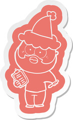 cartoon  sticker of a bearded man with clipboard and pen wearing santa hat