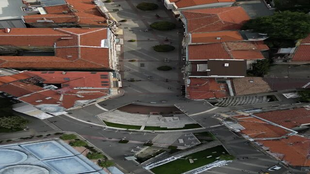 Drone reveal shot flying over the city centre of the district of Plovdiv city in Bulgaria - stock video
