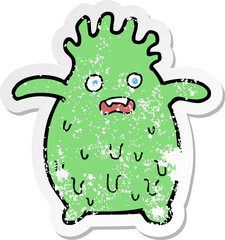 retro distressed sticker of a cartoon funny slime monster
