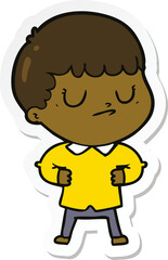 sticker of a cartoon grumpy boy