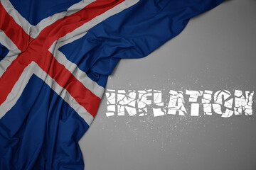Fototapeta na wymiar waving colorful national flag of iceland on a gray background with broken text inflation. 3d illustration