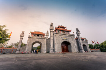 Main gate of Hung King Temple, Phu Tho Province, Vietnam. Text on gate in English meaning Hung King...