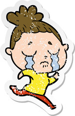 Obraz premium distressed sticker of a cartoon crying woman running away