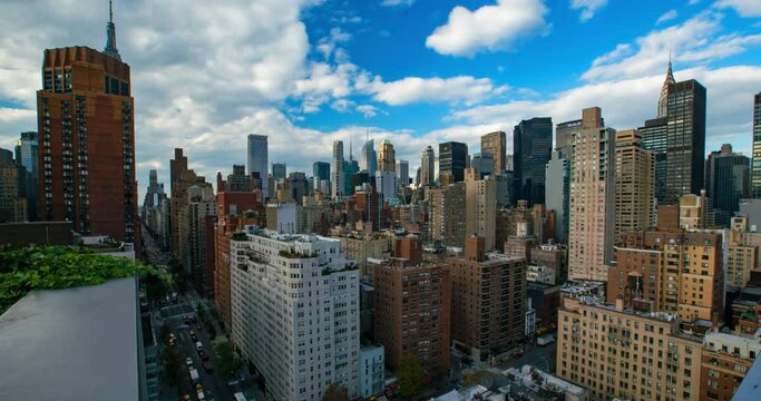 Lockdown Time Lapse Shot Of Buildings Against Sky In Downtown City - New York City, New York