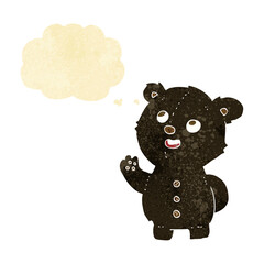 cartoon cute black bear cub with thought bubble