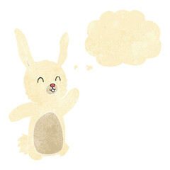 Obraz premium cartoon happy rabbit with thought bubble