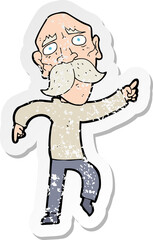 retro distressed sticker of a cartoon sad old man pointing