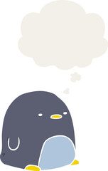 cute cartoon penguin and thought bubble in retro style