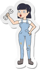 sticker of a cartoon mechanic woman