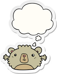funny cartoon bear and thought bubble as a printed sticker