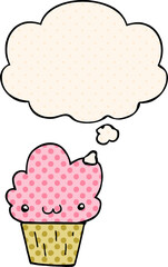 cartoon cupcake with face and thought bubble in comic book style