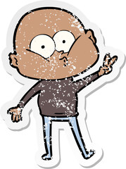 distressed sticker of a cartoon bald man staring