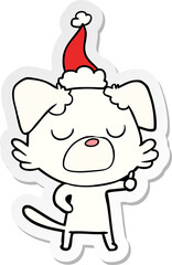 sticker cartoon of a dog wearing santa hat