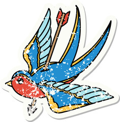 traditional distressed sticker tattoo of a swallow pieced by arrow