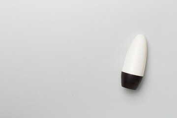 Natural deodorant on color background, top view