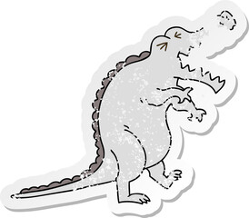 distressed sticker of a quirky hand drawn cartoon crocodile