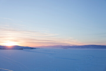 Fototapeta na wymiar Lake Baikal, winter nature. Sunset landscape