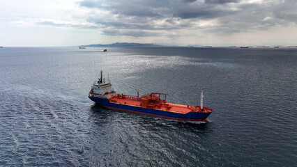 Aerial drone photo of industrial LPG tanker cruising deep blue Mediterranean sea