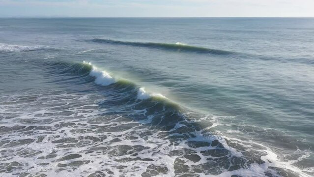 Drone footage of Atlantic waves in south Spain breaking next to the beach in El Palmar, Cadiz