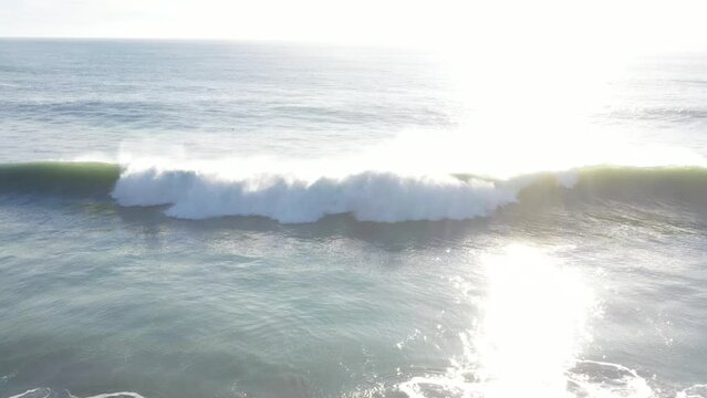 Drone footage of Atlantic waves in south Spain breaking next to the beach in El Palmar, Cadiz