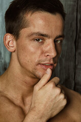 Obraz premium Young attractive man posing in the studio.