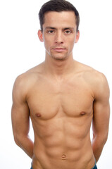 Fototapeta premium Young attractive man posing in the studio.