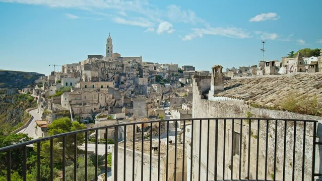 View of a gorgeous old town, Sassi di Matera city center in Italy. Amazing city on a rocky outcrop in the region of Basilicata with a complex of cave dwellings carved into the mountainside.