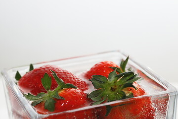 strawberries on a white background, strawberries in a vase, strawberries on the table, vitamins, dessert, strawberries for champagne, sweet berries, table decoration, red on white, decoration