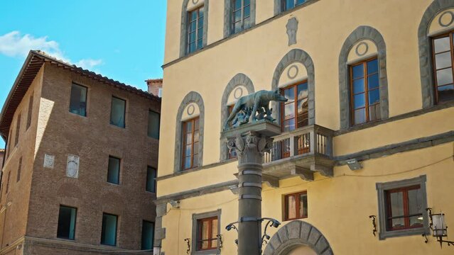 Statue Of Remus And Romulus With Wolf In Siena, Italy. City in Tuscany with medieval brick buildings in 4K.