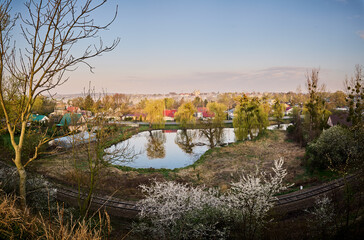 Fototapeta na wymiar Panorama of Krasnystaw from the pond and the railway line
