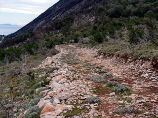 Rocky mountain road with big stones