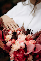 Wedding. The bride's bouquet. Wedding bouquet . A bouquet of red flowers