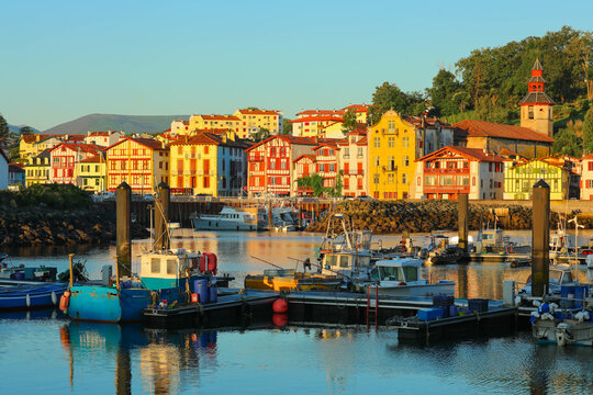 Traditional half-timbered basque houses in port of Saint Jean de Luz, Nouvelle-Aquitaine, France