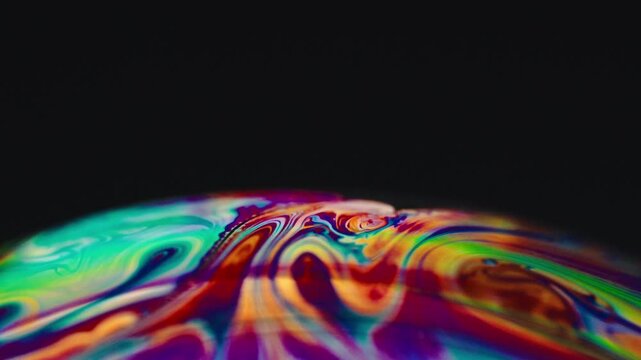 Colorful Ink liquid art swirling underwater red blue yellow abstraction